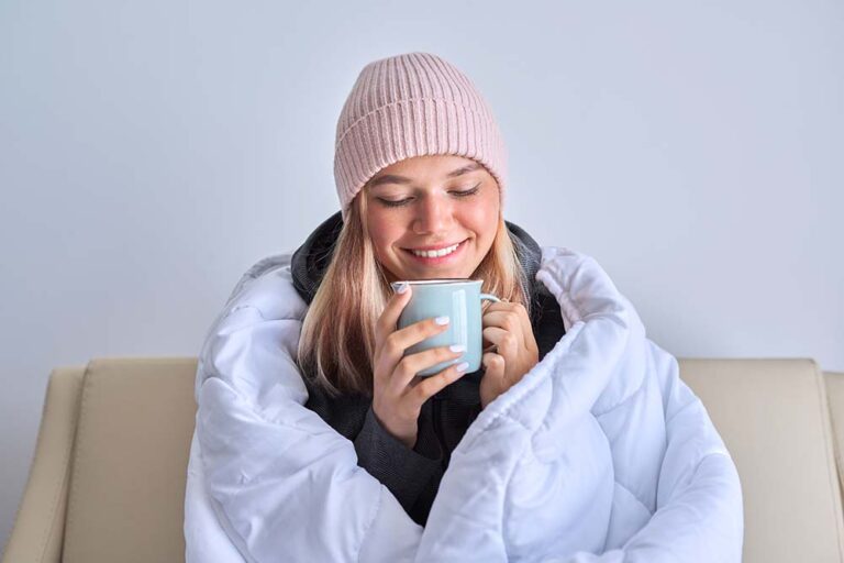 How can I keep warm indoors with no heating?